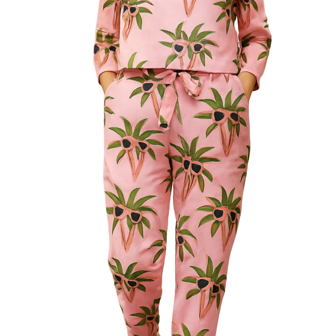 Cool Palms women cord sets featuring a pink top and pants with green palm trees wearing sunglasses print.