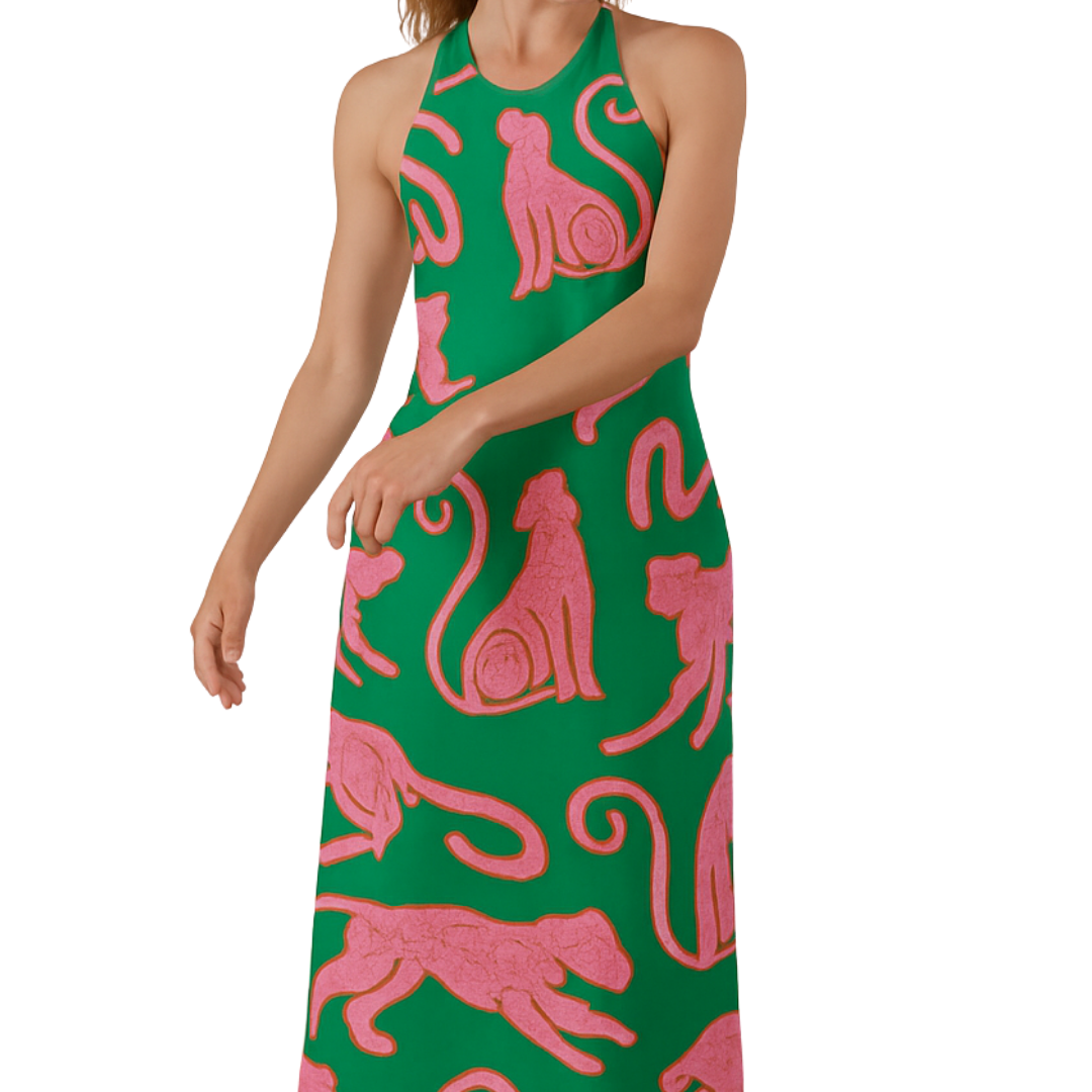 Maxi on the Prowl halter-neck maxi dress with bold pink panthers on green, perfect for making moves and breaking norms.