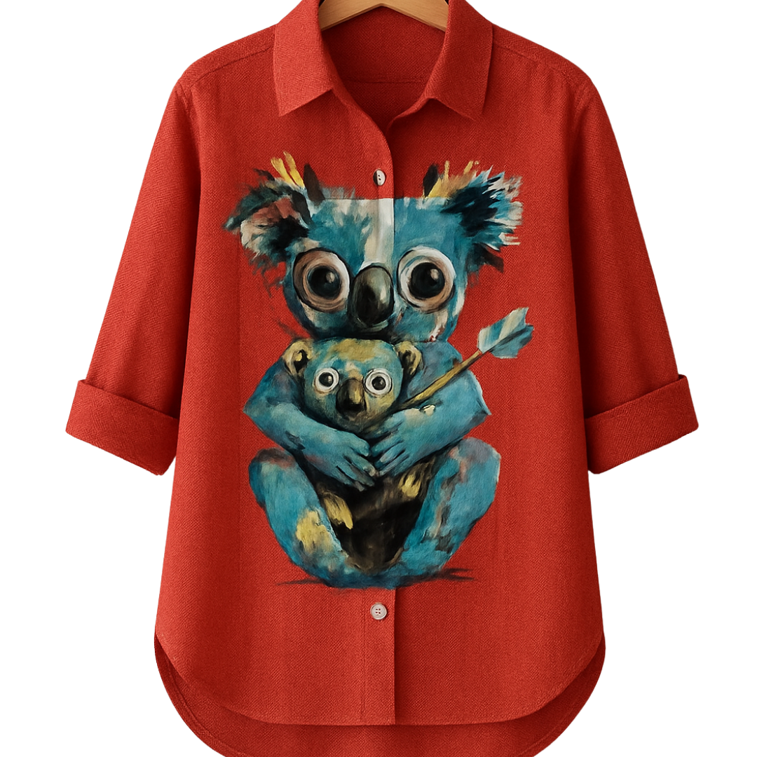 Odd Koalition Shirt rust-red with surreal big-eyed koala clutching mini-me illustration on front.