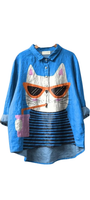 Sippin’ sass Shirt oversized linen blend with cat print wearing sunglasses and sipping drink on blue background