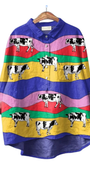 Cownival Shirt oversized with colorful stripes and playful black and white cow prints for a fun fashion statement.