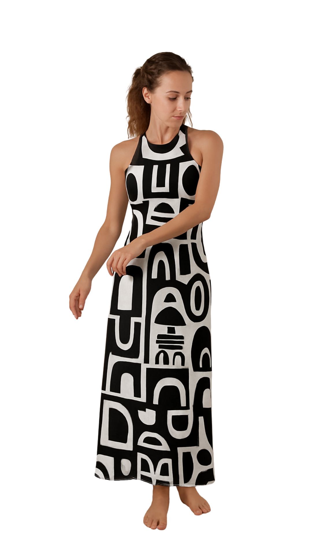 Woman wearing a black and white abstract halter-neck dress with bold shapes, Decode Me Maxi on a white background.