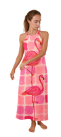 Woman wearing FlaminGlow Maxi halter-neck dress with bold pink flamingo print on a dreamy pink grid background
