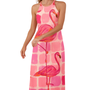 Woman wearing FlaminGlow Maxi halter-neck dress with bold pink flamingo print on a dreamy pink grid background