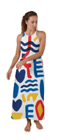 Maxi Cipher halter maxi dress with bold shapes, waves, hearts, and cryptic letters in red, blue, and yellow colors.