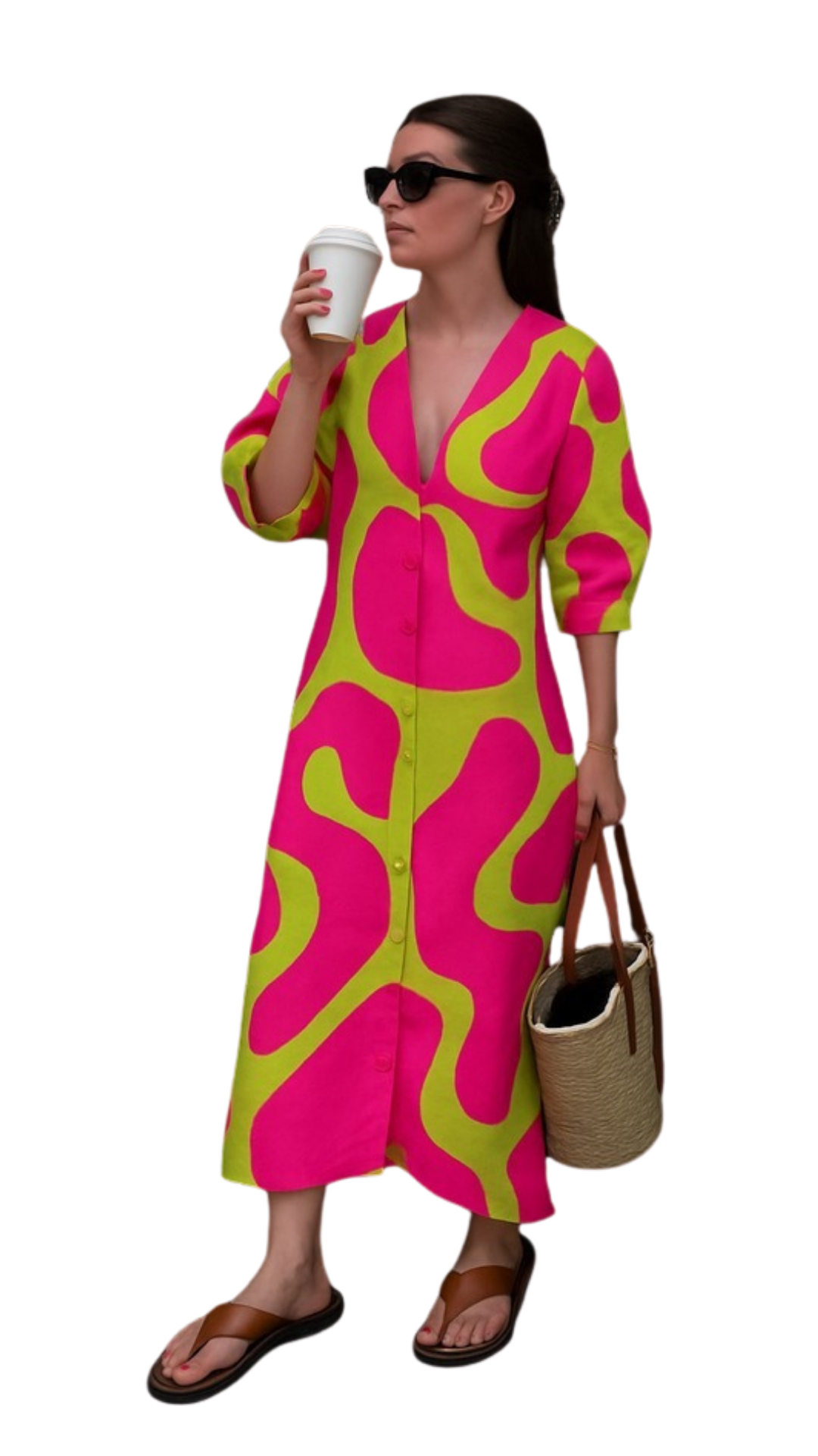 Woman wearing vibrant pink and green Neon Noir Dress holding coffee cup and straw tote bag with sunglasses.