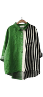 Optical Oddity Shirt with half green solid fabric and half warped black and white vertical stripes design.