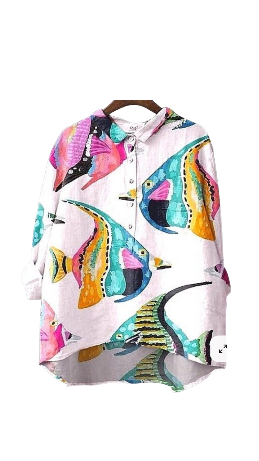 Sea No Evil Shirt oversized with bold tropical fish in bright colors on a pink ocean background.